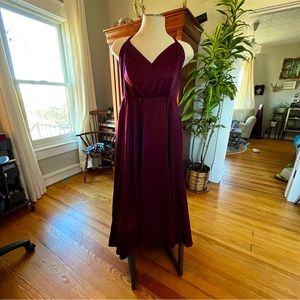 NWOT gorgeous cocktail dress with hi-low cut and corset back